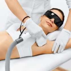 Laser hair removal services being done on the armpit.