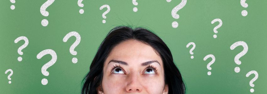 A woman thinking about what type of laser resurfacing procedure is best for her skin.