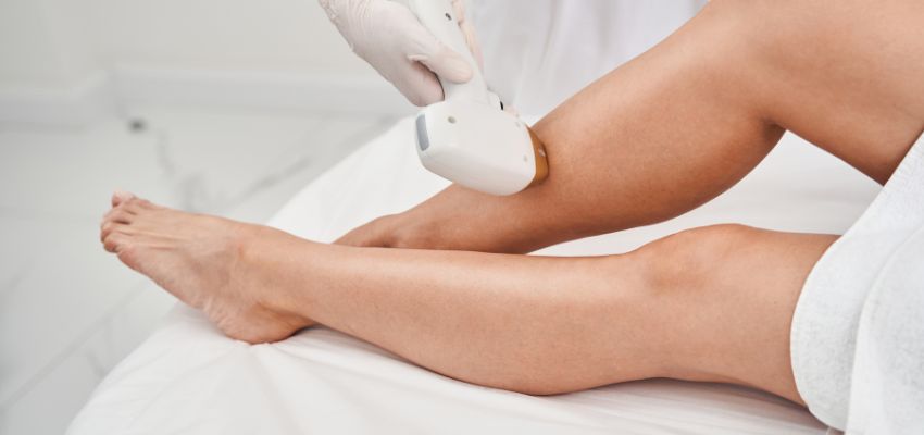 The woman undergoes laser hair removal to have flawless legs.