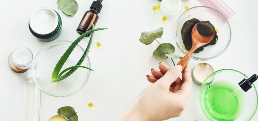 The woman makes homemade skin care.