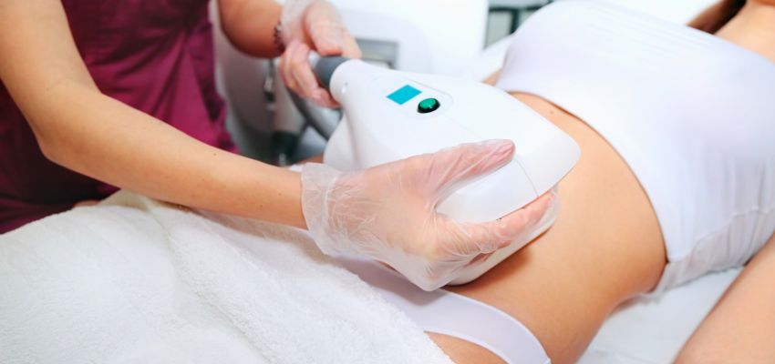 Patient undergoing CoolSculpting treatment in a certified clinic.