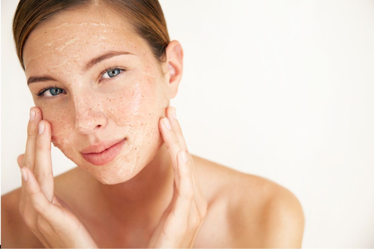 The woman has over-exfoliated skin.